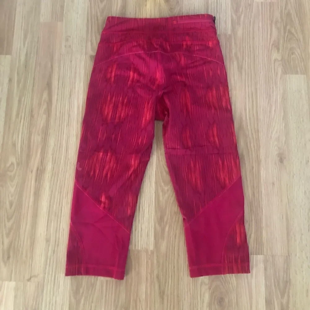 LOLE Pink Mesh Back Zipped Pocket Capri Leggings